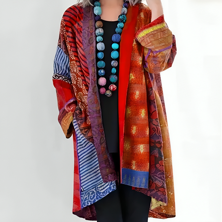 Multicolor boho patchwork cardigan with open front and long sleeves, red and purple tones