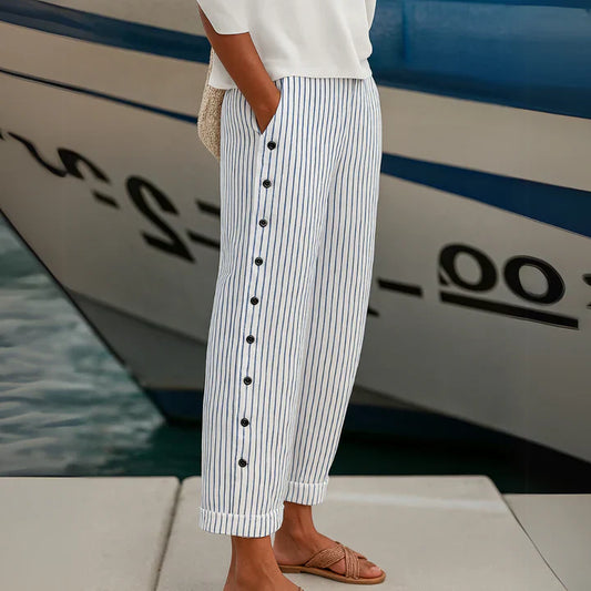 Gray striped casual pants with button front, vertical blue lines and cuffed hem