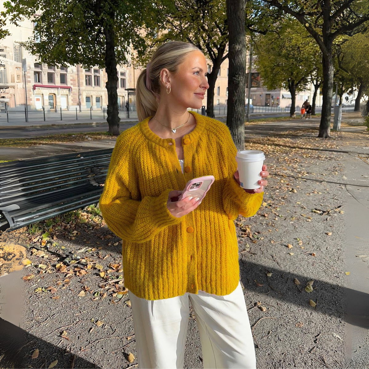 Mustard yellow button-front round-neck long-sleeve knit cardigan with ribbed trim