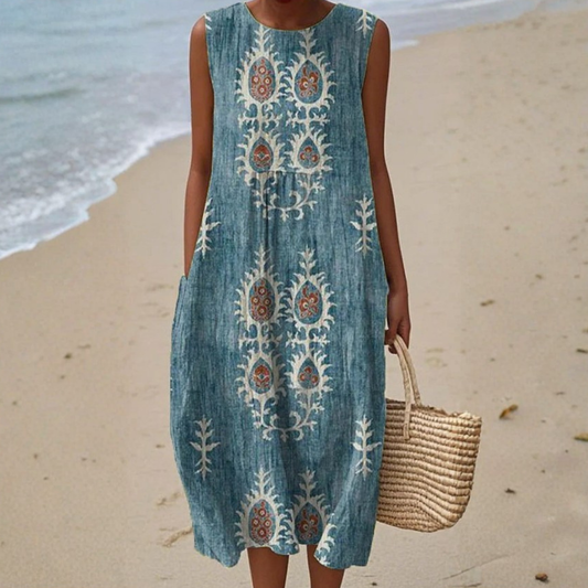 Blue sleeveless boho midi dress with round neckline and embroidered floral medallion print