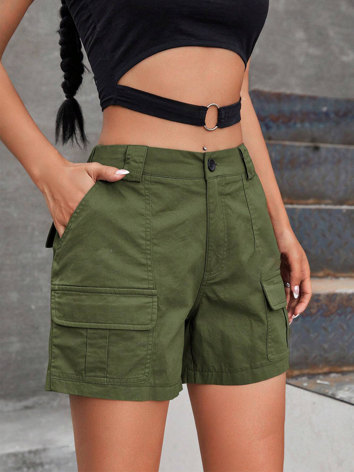 Olive green cargo shorts with side flap pockets and adjustable waist strap with metal ring