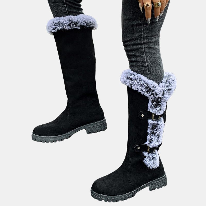 Black mid-calf suede boots with light blue faux-fur cuff trim and buckle strap detail