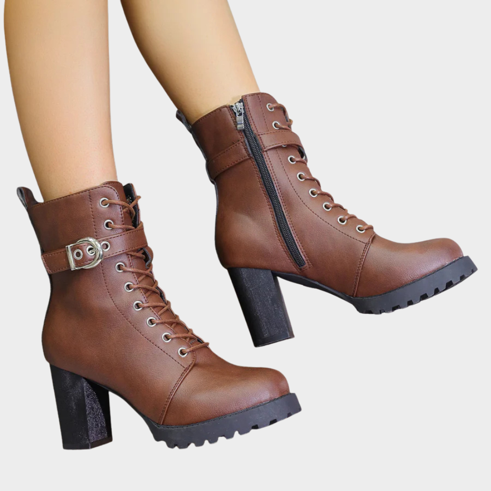 Brown flared heel ankle boots with side zip, lace-up front, and chunky tread sole
