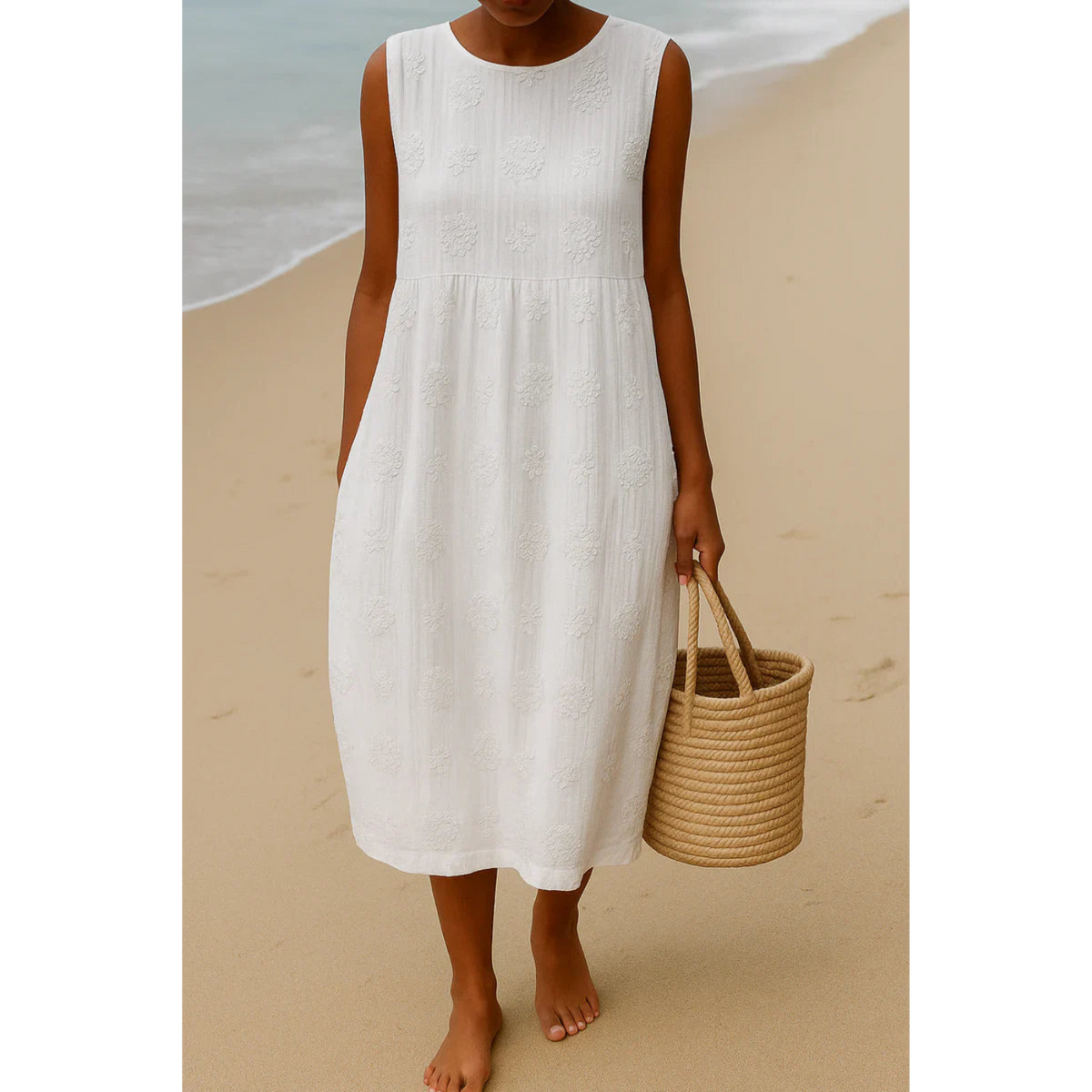 White embroidered sleeveless midi dress, round neck, floral textured motifs