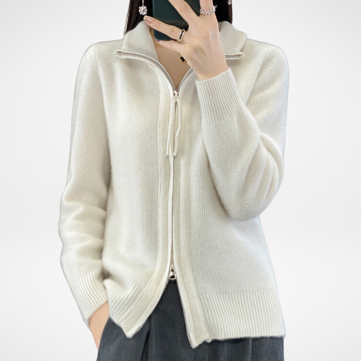 White zip-front knit sweater with drawstring at stand collar