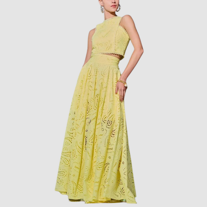 Yellow sleeveless lace crop top and maxi skirt two-piece set with eyelet pattern