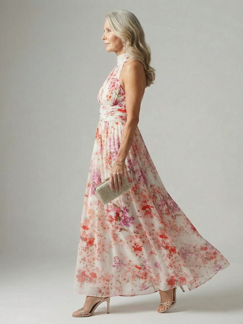 Floral halter maxi dress in a draped silhouette with cinched waist and open neckline