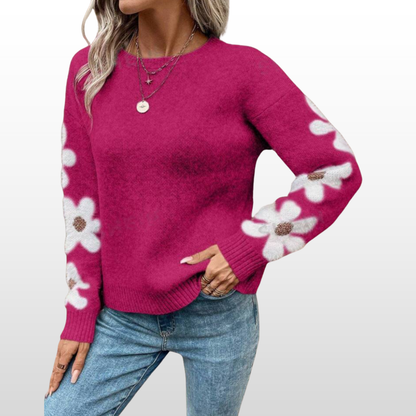 Magenta round-neck sweater with white floral sleeves and ribbed cuffs