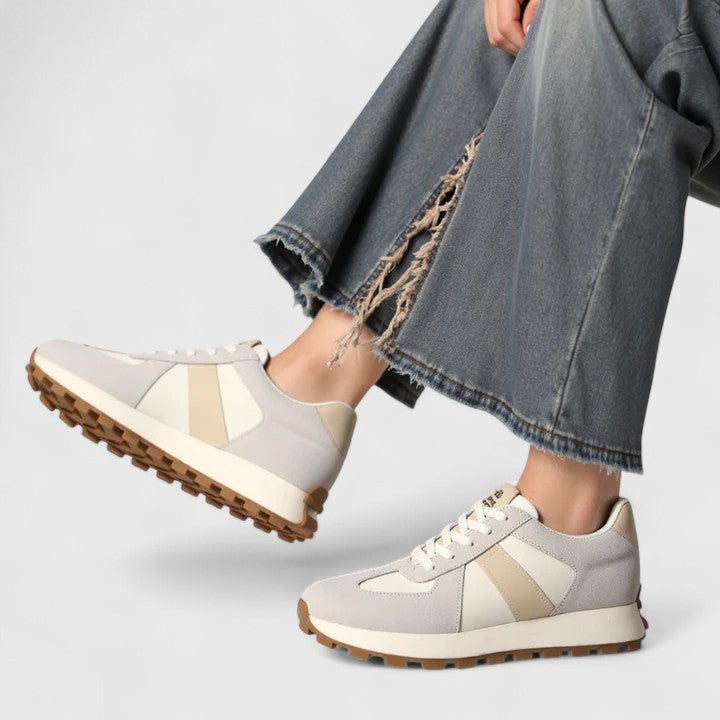 Color-block lace-up sneakers in light gray with beige panels and brown tread sole