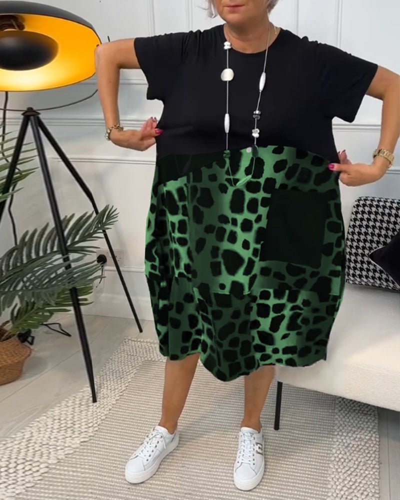 Women’s midi dress, black short-sleeve bodice and green leopard-print gathered skirt