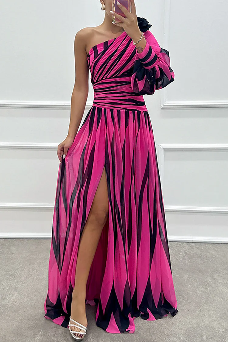 One-shoulder maxi dress in rose red with black stripes, pleated skirt, side slit