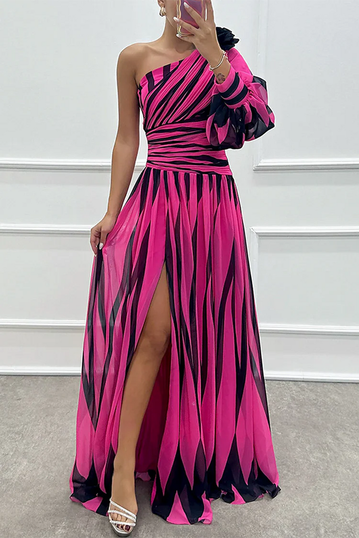 One-shoulder maxi dress in rose red with black stripes, pleated skirt, side slit