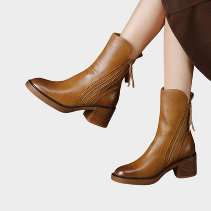 Brown leather ankle heeled boots with side zip and block heel, side view