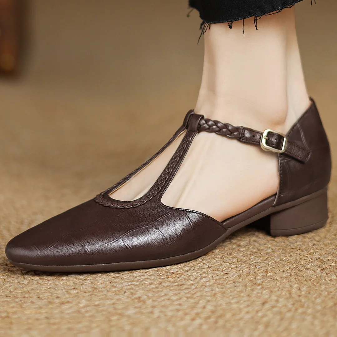 Brown leather Mary Jane low heel with ankle strap buckle and open cutout design