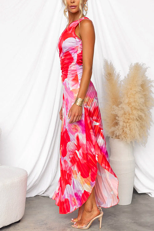 Red one-shoulder maxi dress with watercolor floral print and sleeveless draped fit
