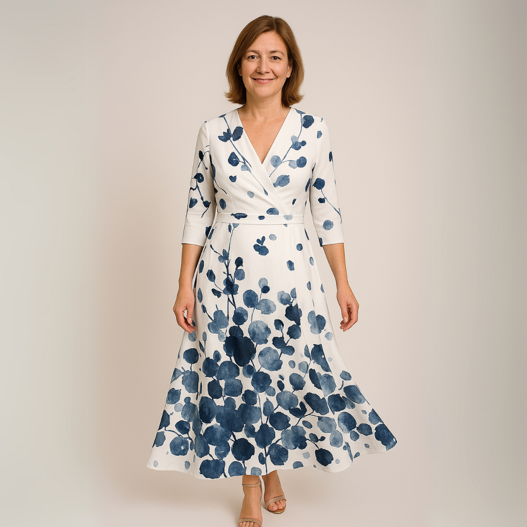 White dress with navy-blue floral print, 3/4 sleeves, V-neck wrap midi