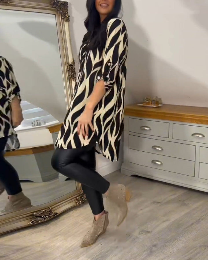 Printed loose-fit top with V-neck and abstract zebra pattern, side view