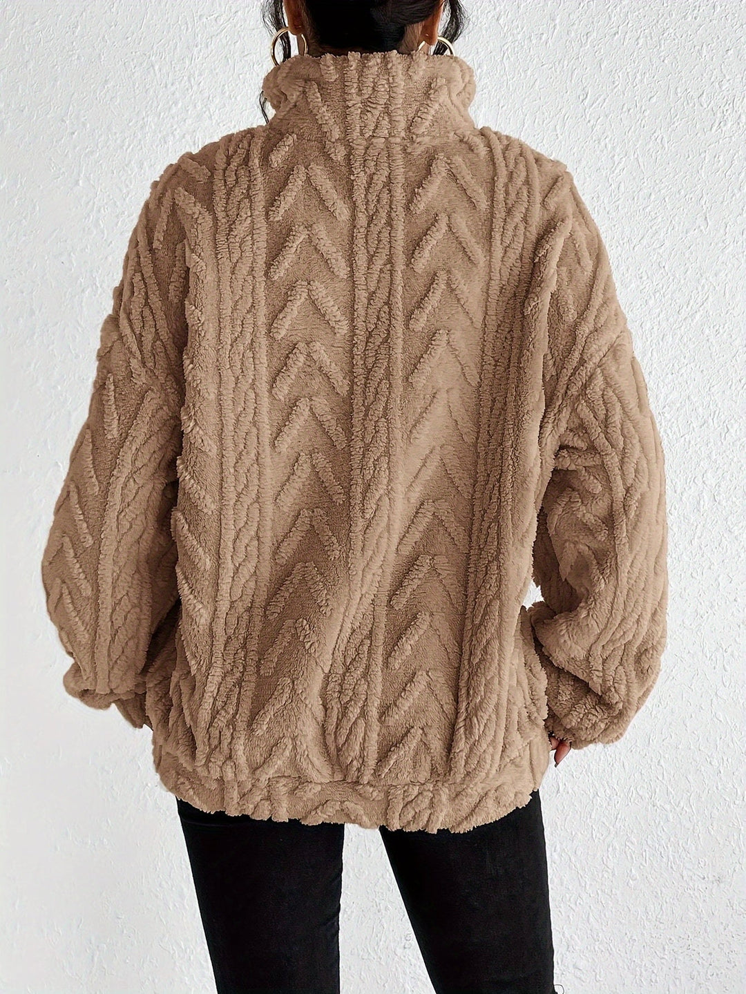 Warm knit quarter-zip sweater in tan, cable texture, long sleeves, back view.