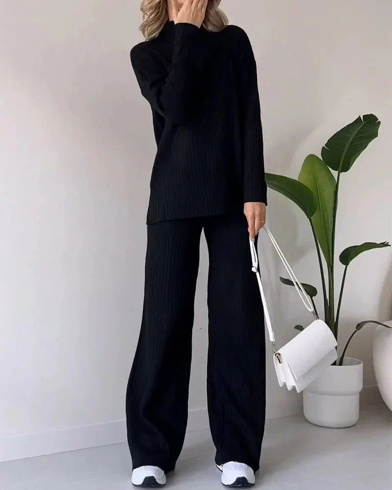 Black ribbed knit sweater and wide-leg pants set, mock neck with long sleeves
