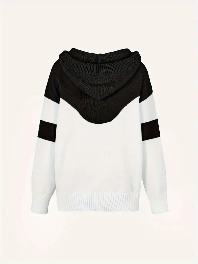Black and white dual-tone hoodie with hood and drawstring, back view