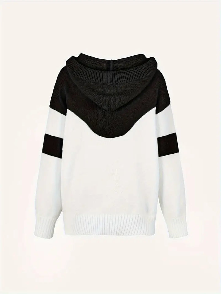Black and white dual-tone hoodie with hood and drawstring, back view