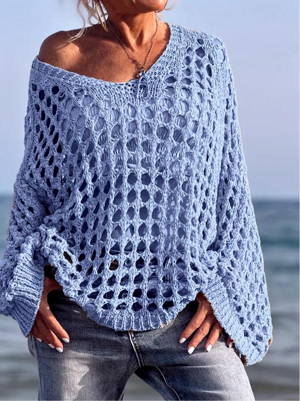 Comfy long-sleeve knit top in steel blue with openwork pattern and fringe trim