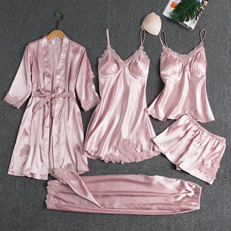 Women’s pink satin nightwear set with lace-trim robe, camisole, and matching shorts