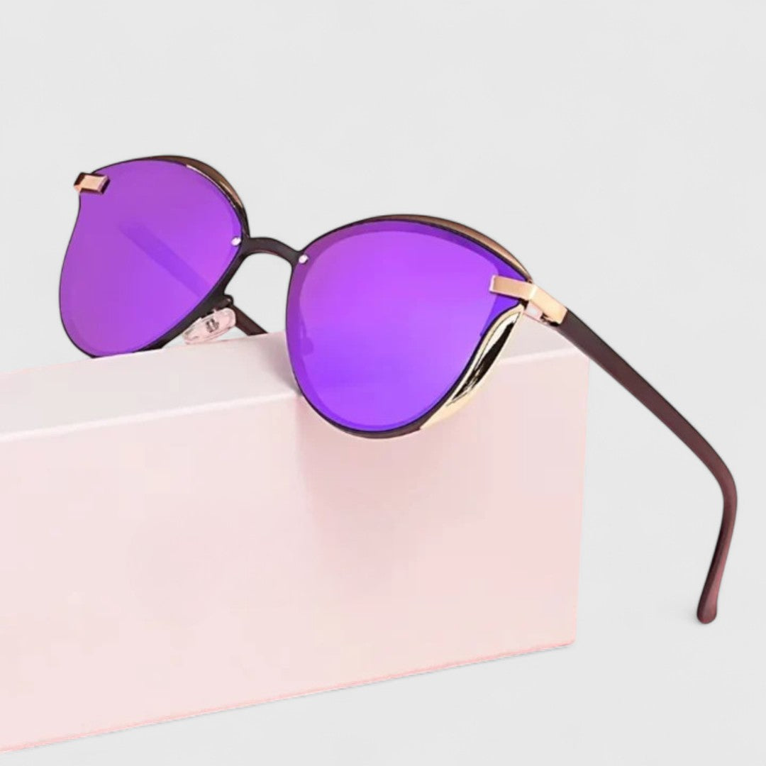 Purple mirrored sunglasses with slim gold bridge and curved dark brown temples