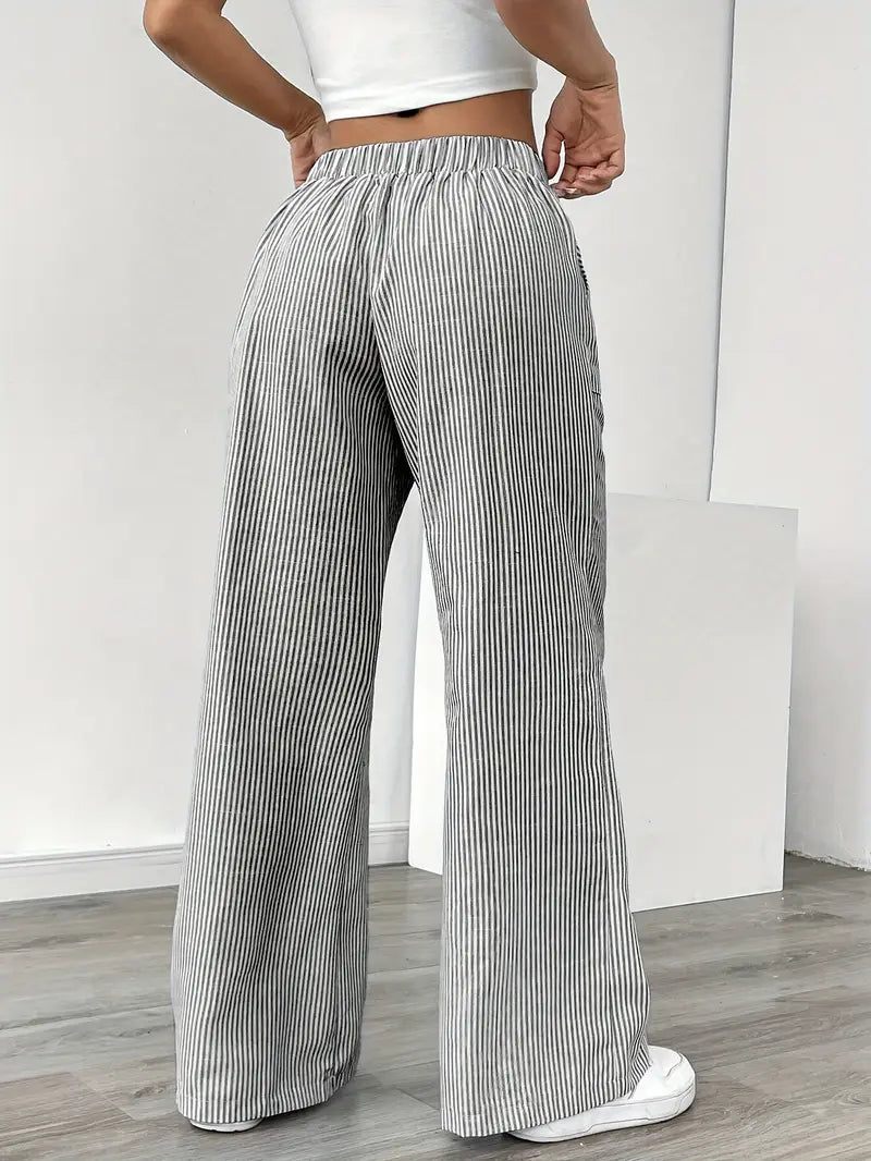 Striped wide-leg pants with elastic waistband, black-and-white vertical stripes, relaxed fit