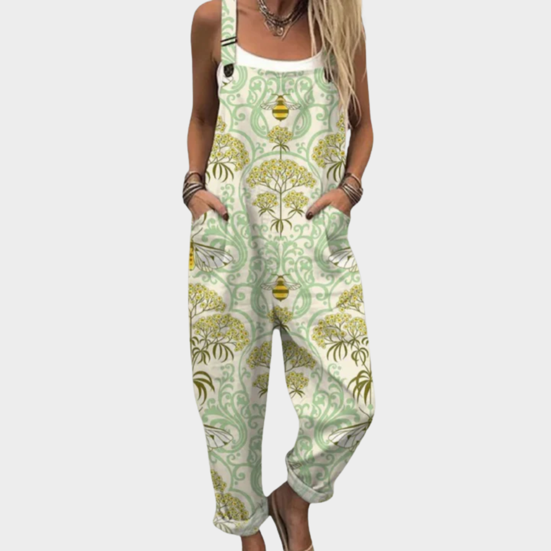 Green printed sleeveless overalls with bib front and pockets, wide-leg pant legs