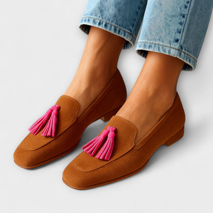 Brown suede trainers with pink tassel detail and low block heel