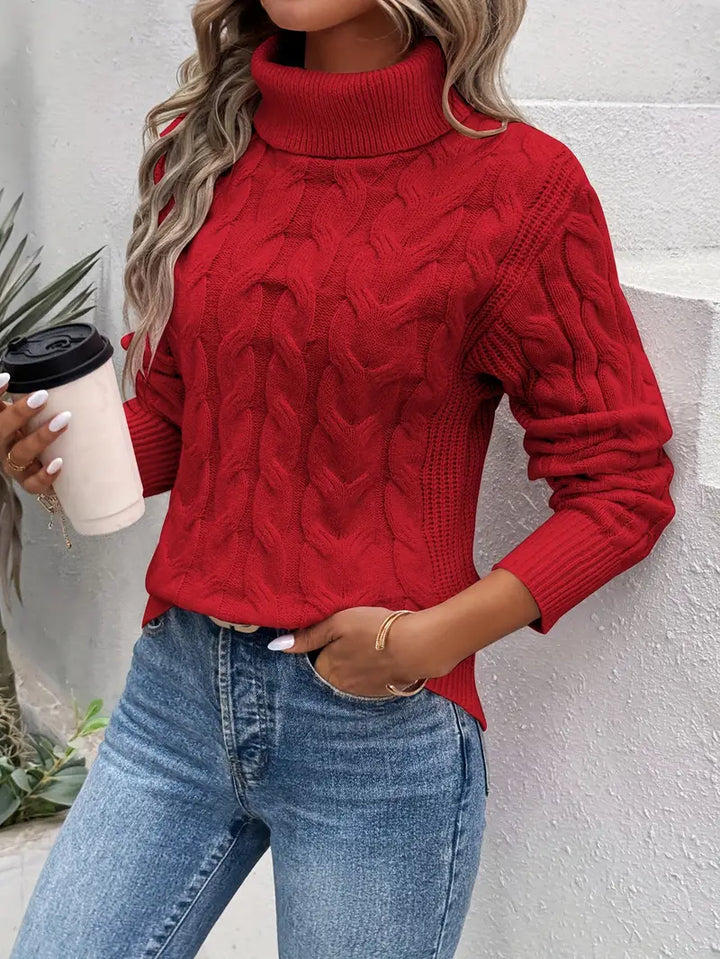 Red cable knit turtleneck sweater with long sleeves