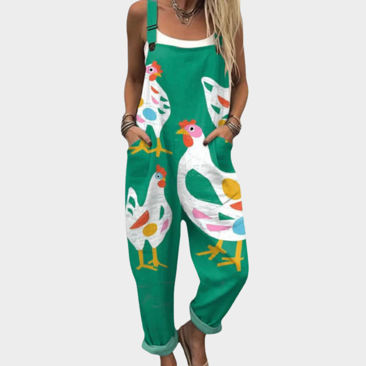 Green printed overalls with colorful bird motif, adjustable straps and front bib