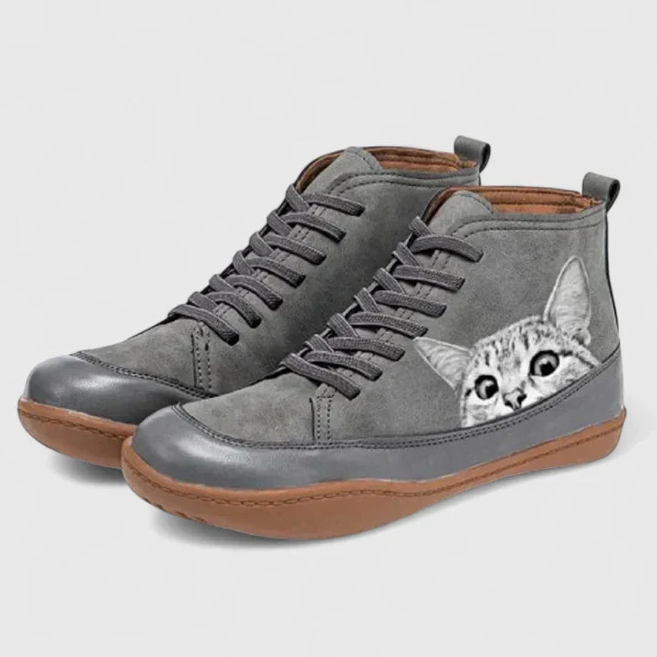 Gray lace-up orthopedic boots with gray cat face patch and cushioned sole