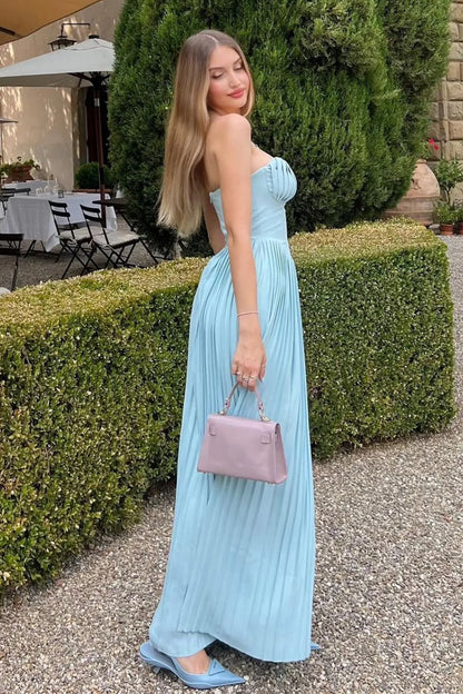 Light blue strapless maxi dress with fitted bodice and pleated long skirt
