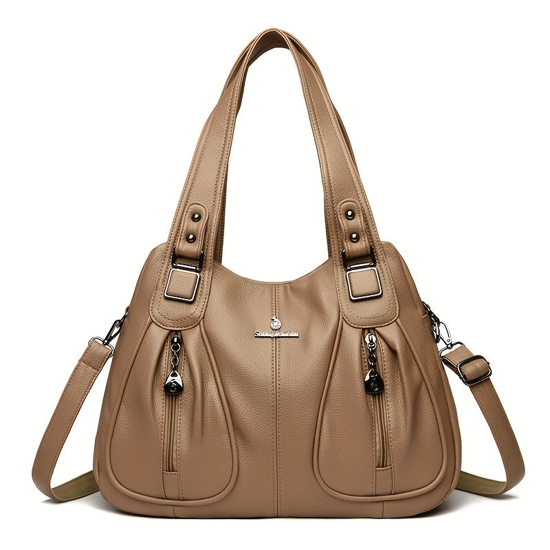 Women’s casual shoulder bag in beige with top handles and adjustable shoulder strap.
