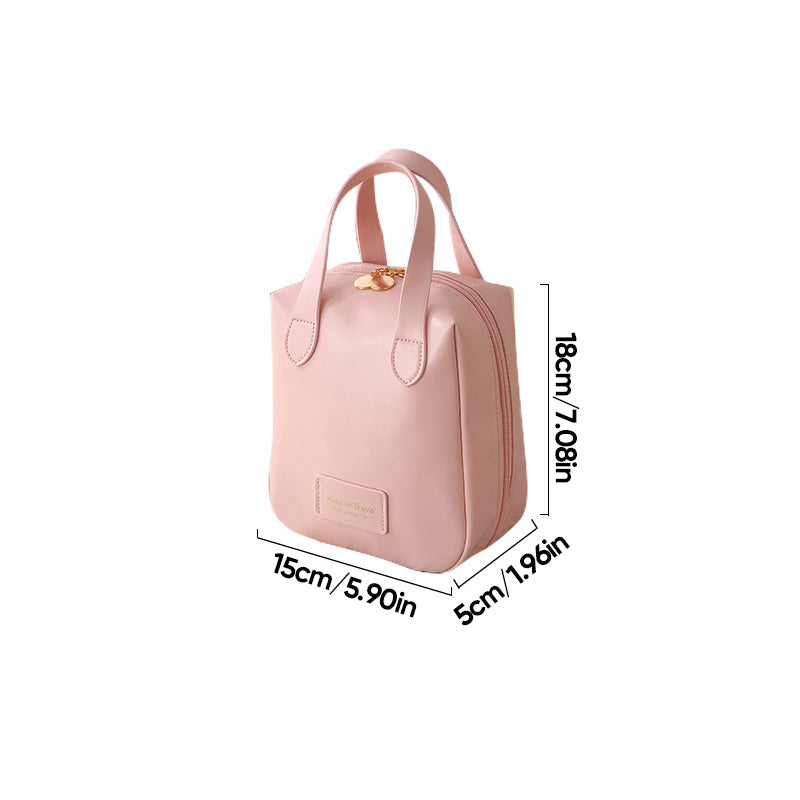 Pink travel bag with top handles and front logo patch