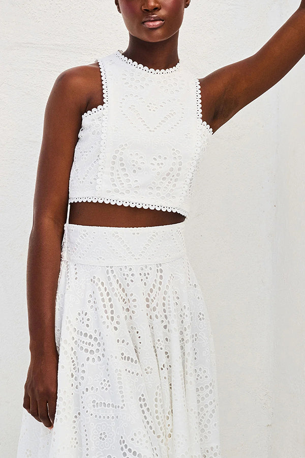 White embroidered sleeveless crop top and high-waist maxi skirt set with scalloped edges