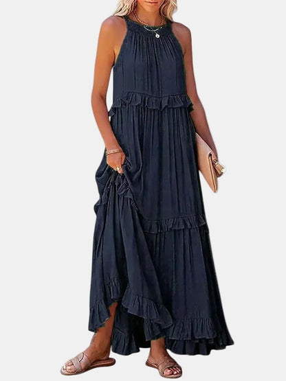 Dark blue sleeveless long dress with tiered ruffle hem and gathered neck