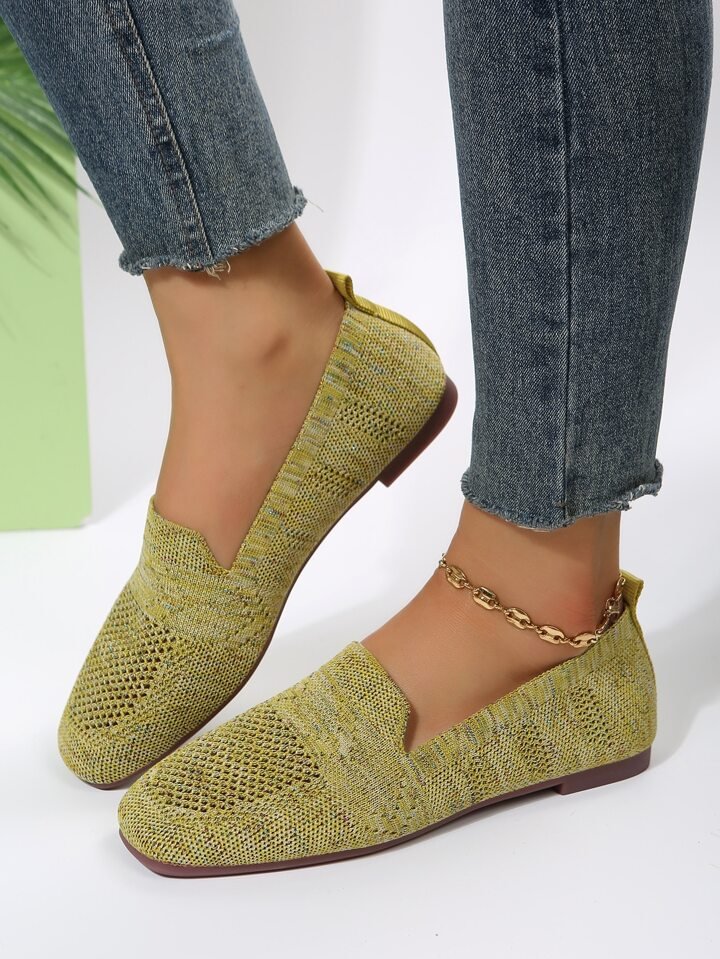 Yellow-green knit slip-on orthopedic shoes with low heel and gold chain ankle bracelet