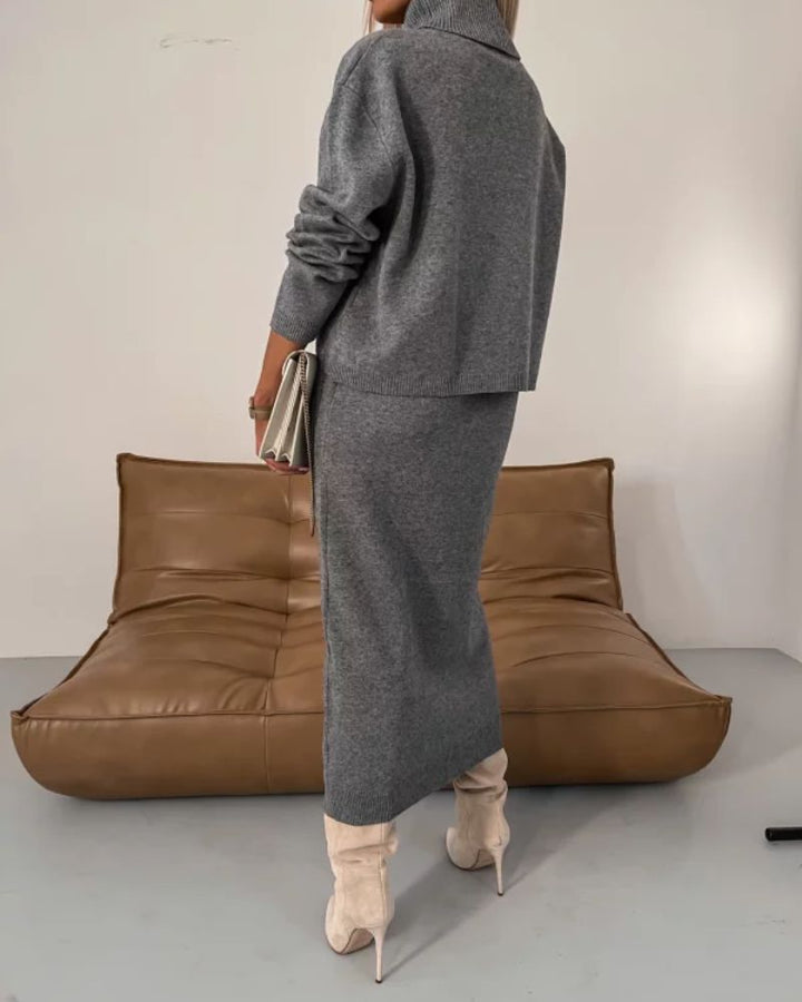 Grey knit midi dress, back view, long sleeves and slim tapered fit