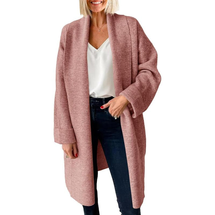 Pink oversized long open-front cardigan, chunky knit with relaxed drape.