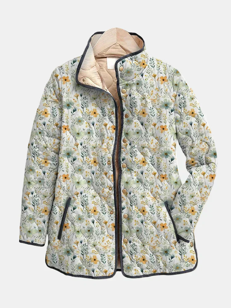 Floral-printed quilted jacket with dark trim, full front zipper and button placket