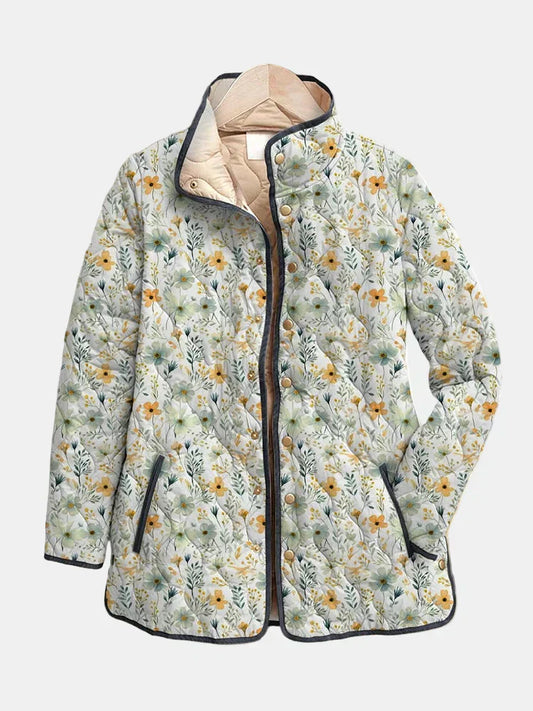 Floral-printed quilted jacket with dark trim, full front zipper and button placket
