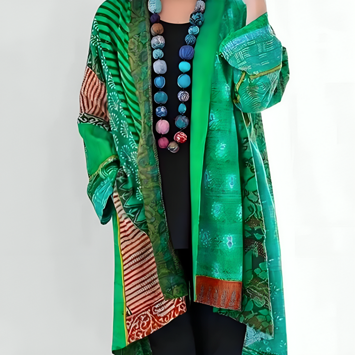 Multicolor boho patchwork cardigan with open front and long sleeves, green and teal tones