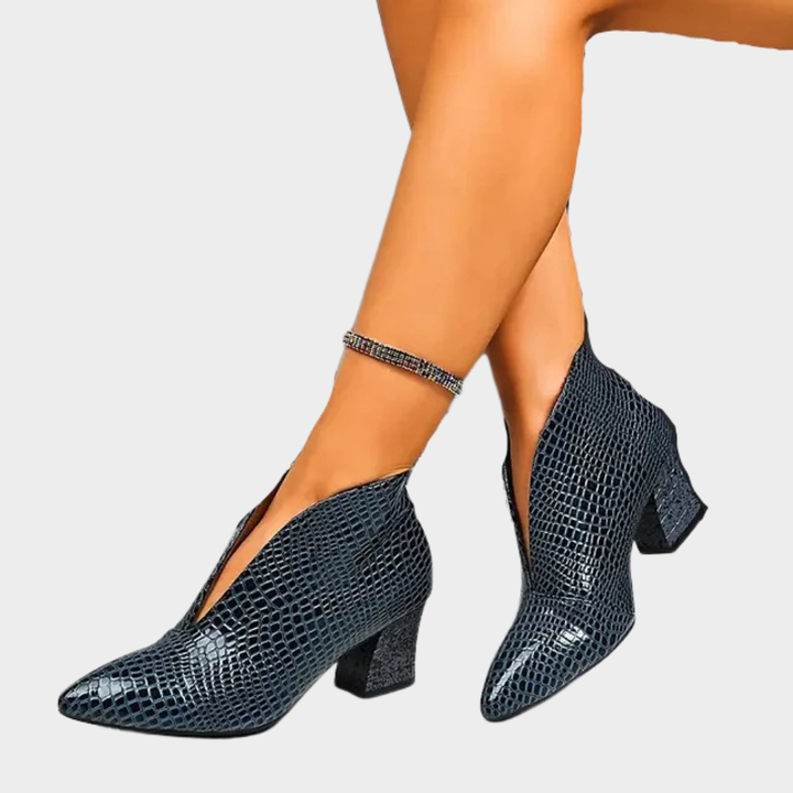 Blue V-cut ankle boots with textured pattern and block heel