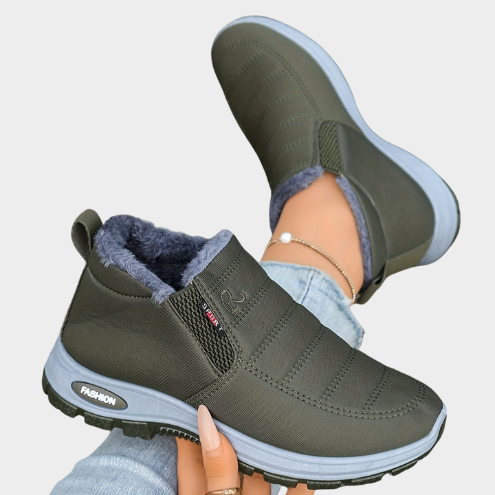 Olive fur-lined ankle boots with elastic side and chunky light sole