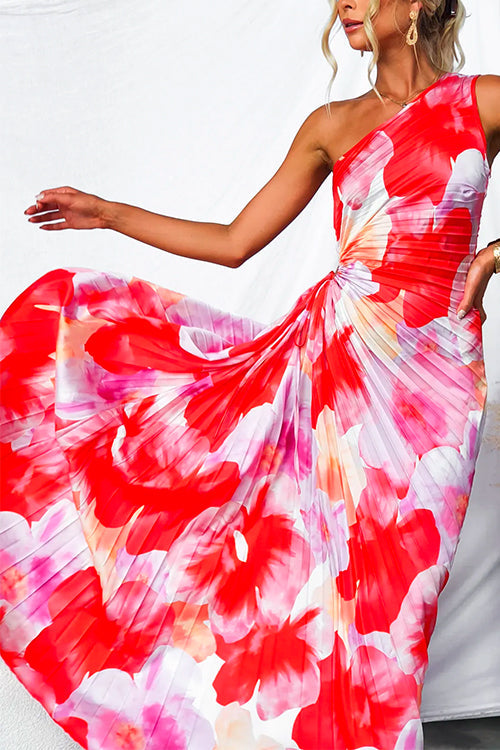 Red one-shoulder maxi dress with flowing watercolor floral print skirt