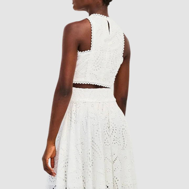 White sleeveless lace crop top and maxi skirt two-piece set with eyelet pattern, back view