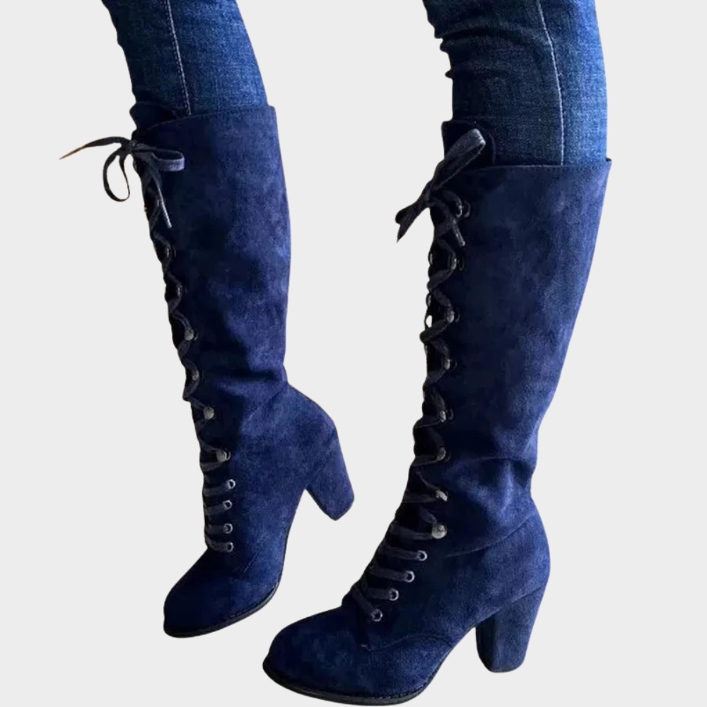 Blue suede lace-up high heel boots with ankle laces and chunky block heel.